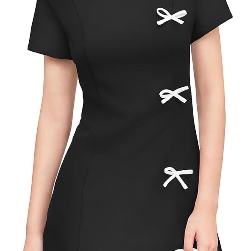 Elegant Black Dress with White Bow Accents